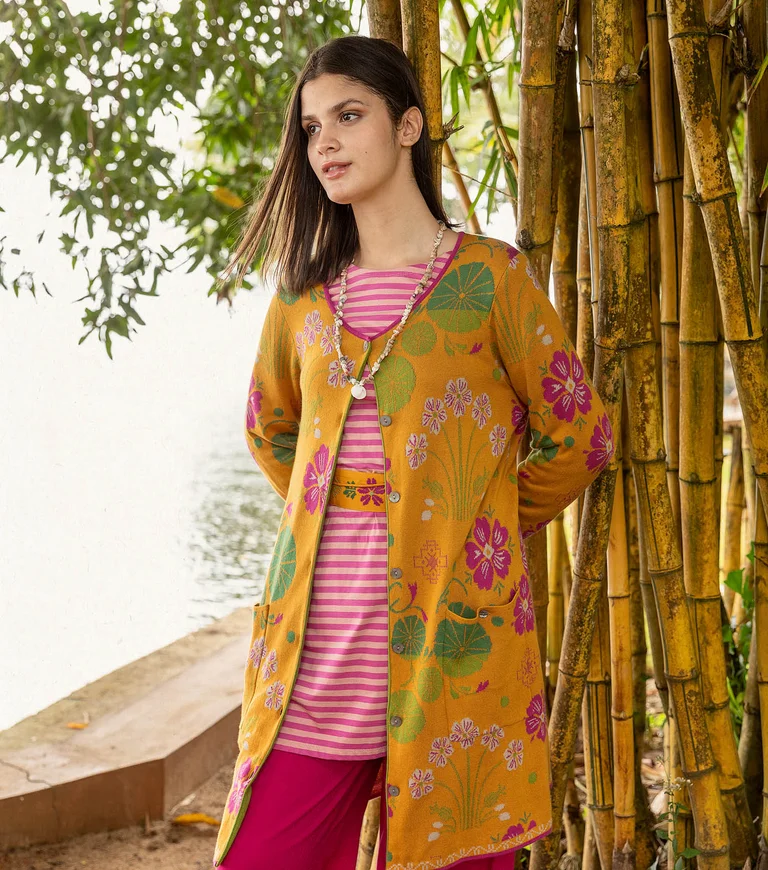 A collage of women wearing patterned clothing from Gudrun Sjödén.