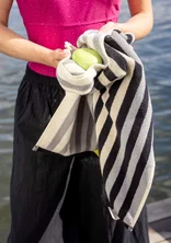 “Sunset” towel in organic cotton - black