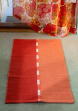 “Meera” organic cotton rug - copper