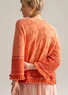 Strickjacke „Naima“ aus Bio-/Recycling-Baumwolle (papaya S)