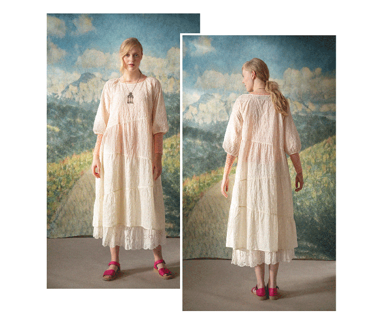 A gif of a woman wearing layers of white clothes from Gudrun Sjödén.