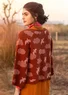 “Flyttfågel” cardigan in a recycled wool/recycled cotton blend (rust/melange XL)