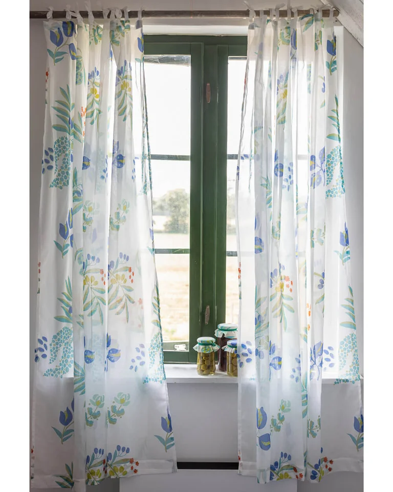 Patterned curtains from Gudrun Sjödén. 