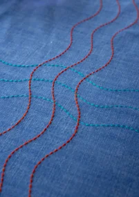 “Stitches” tablecloth in organic cotton - flax blue