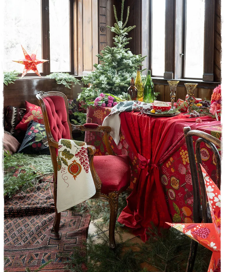 A room with textile, ceramic and decorative items from Gudrun Sjödén’s 2024 Christmas collection. 