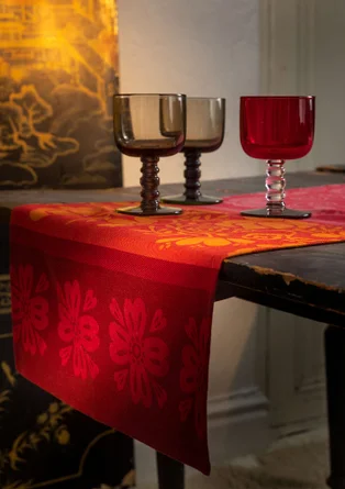 “Vinterros” table runner in organic cotton - tomato