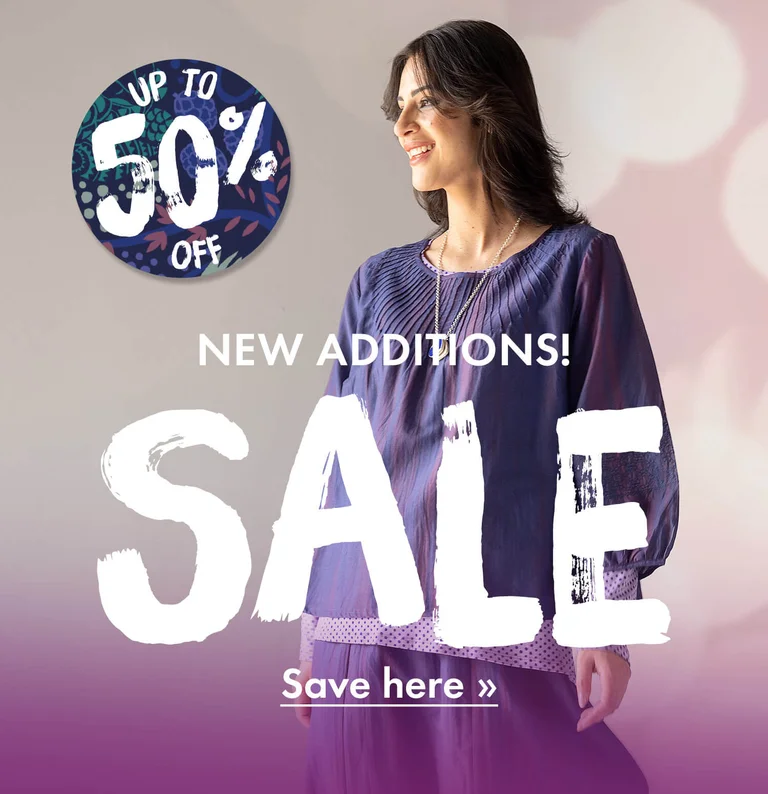 A woman wearing colourful clothes from Gudrun Sjödén.