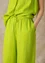 Woven linen trousers (tropical green XL)