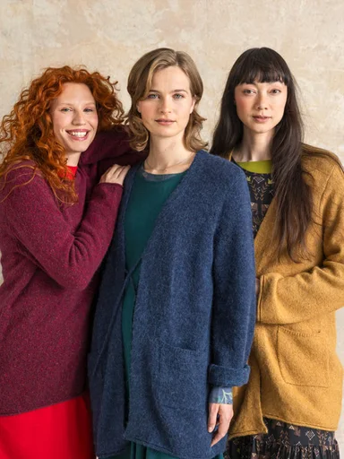 Three women close together wearing clothes from Gudrun Sjödén’s Essentials range.