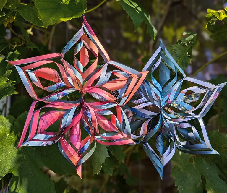 Paper decorations crafted from Gudrun Sjödén catalogues. 