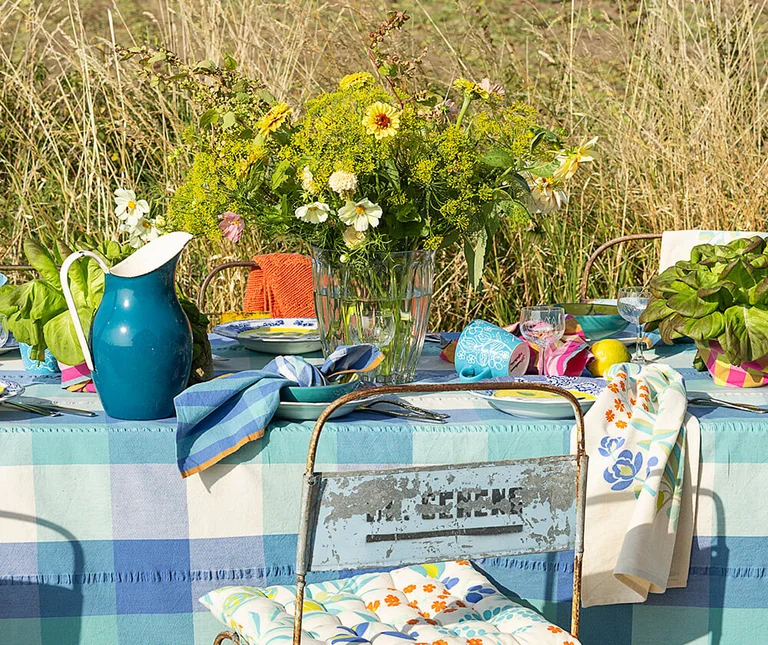 A table set with decor from Gudrun Sjödén. 