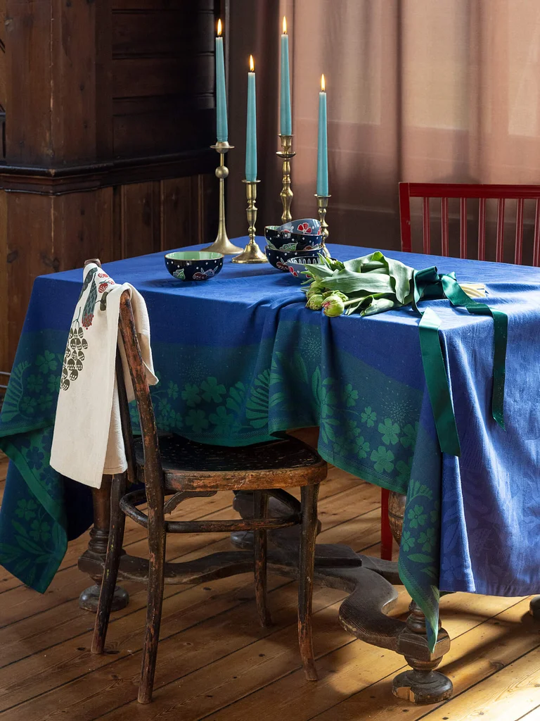 A blue patterned tablecloth from Gudrun Sjödén. 