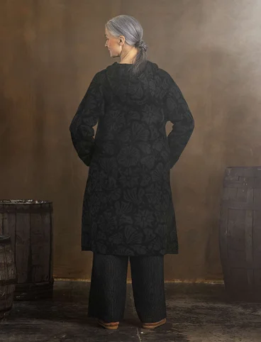 “Wind” knitted coat crafted from felted organic wool - black