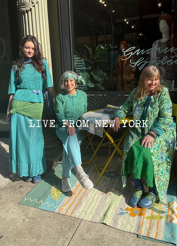 Three women outside the Gudrun Sjödén store in New York.